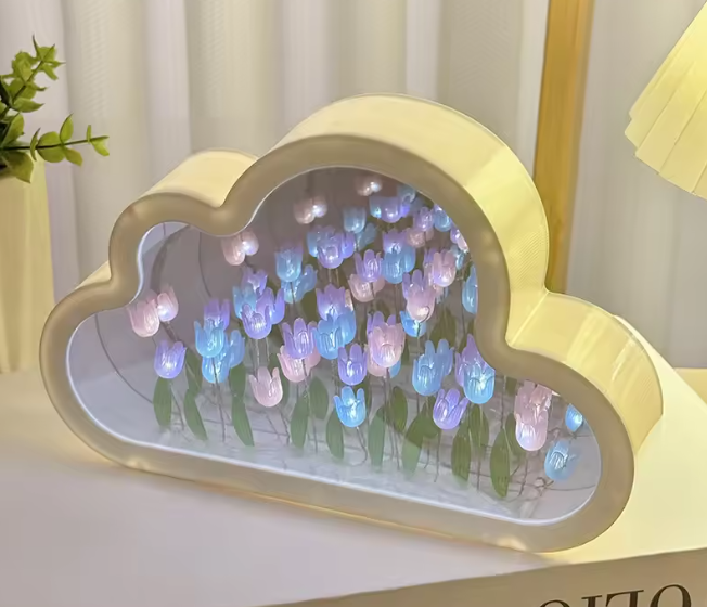 Cloud Tulip Infinity Night Light with colorful tulips inside a cloud-shaped frame, providing a soft glow.